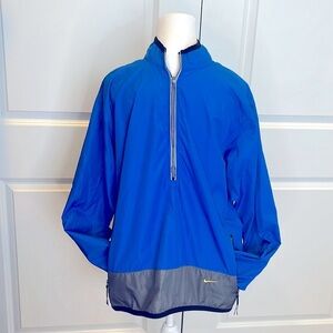 Nike youth L royal blue grey 1/2 zip windbreaker. Loose fit. Great condition